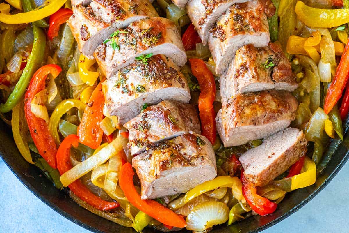 Rich Pork Tenderloin With Peppers And Onions