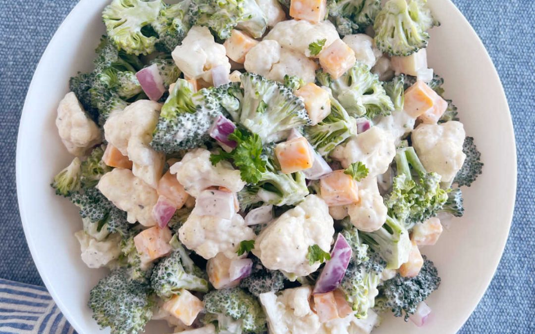 Calamari mayo with cauliflower broccoli salad